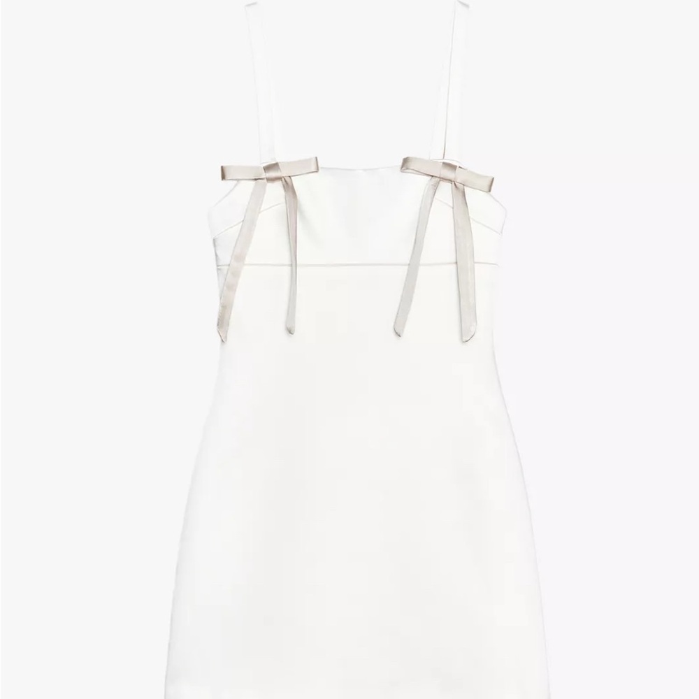Elegant White Dress with Bow Accents